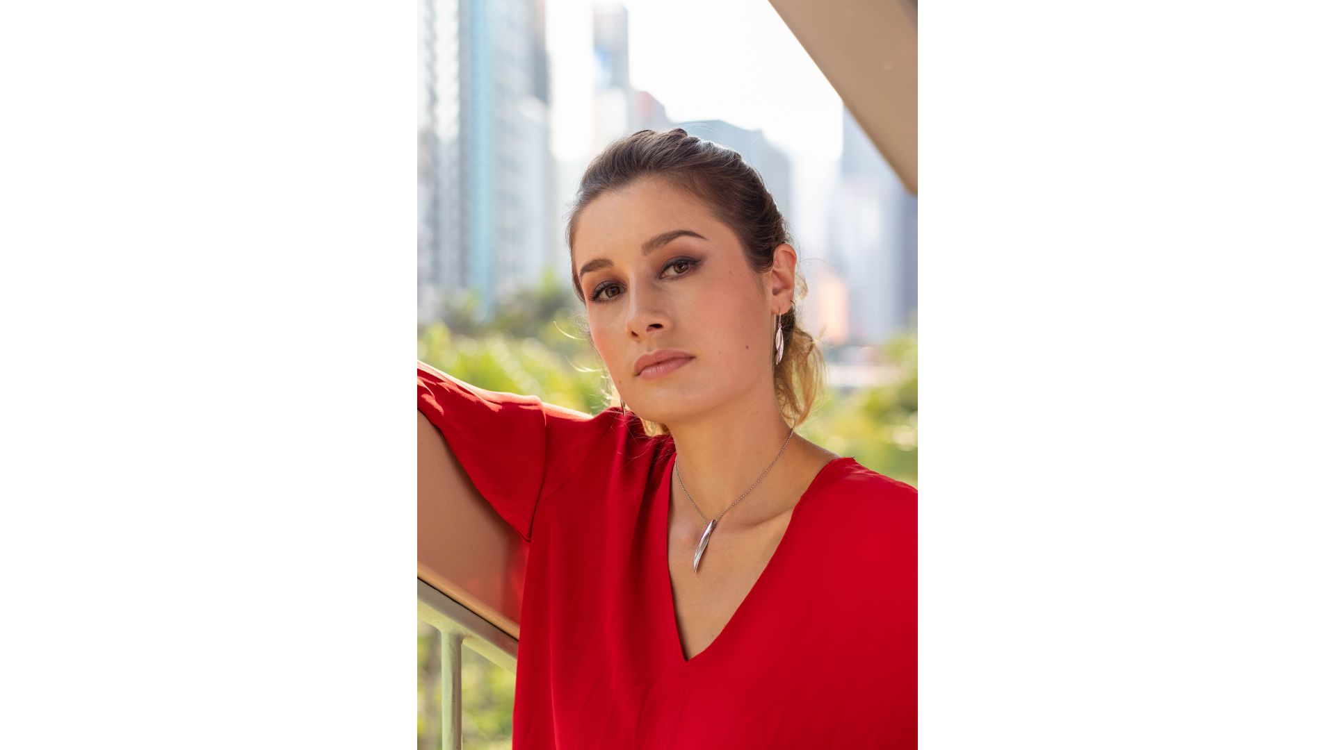 A person in a red shirt

Description automatically generated