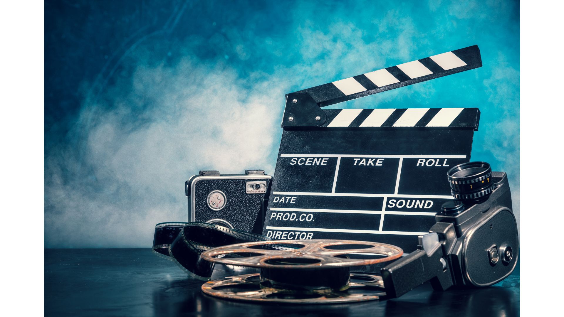 A movie clapper board and film reels
AI-generated content may be incorrect.