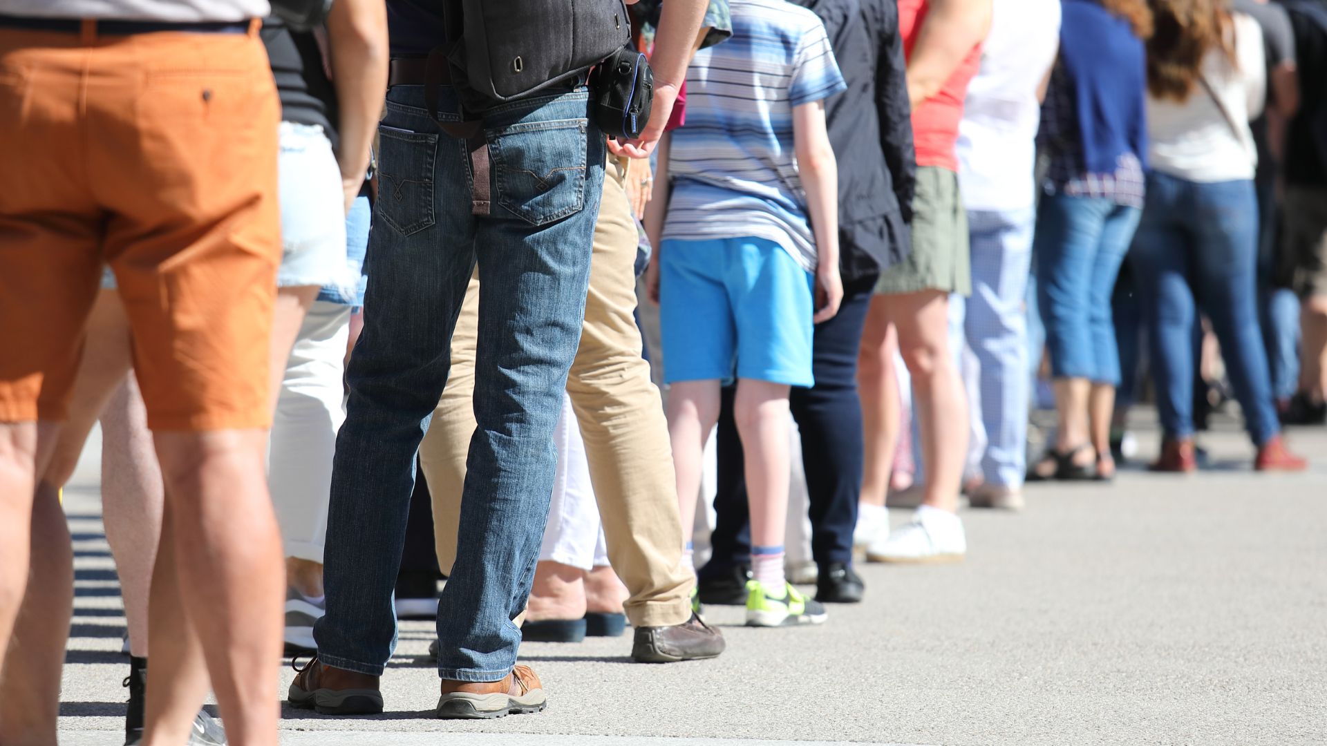 A group of people standing in a lineundefinedundefinedundefinedundefinedAI-generated content may be incorrect.