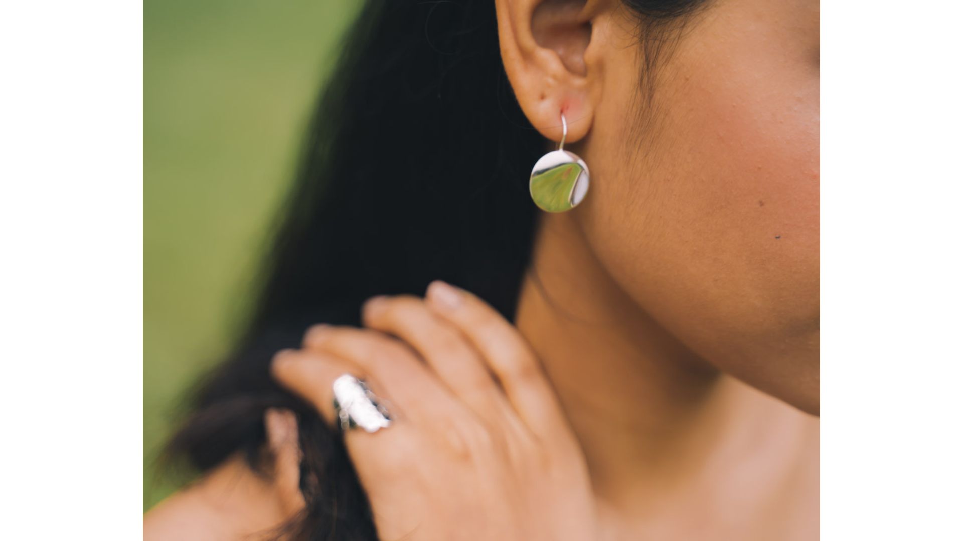 Close-up of a person's ear

Description automatically generated
