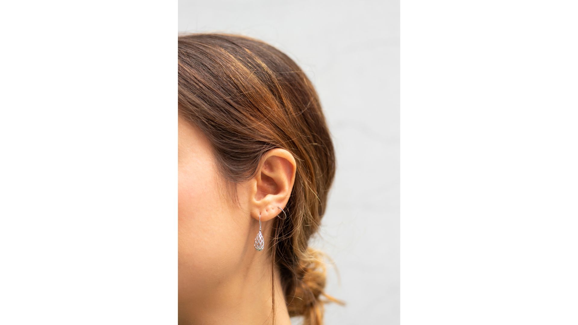 A close up of a person's ear
Description automatically generated