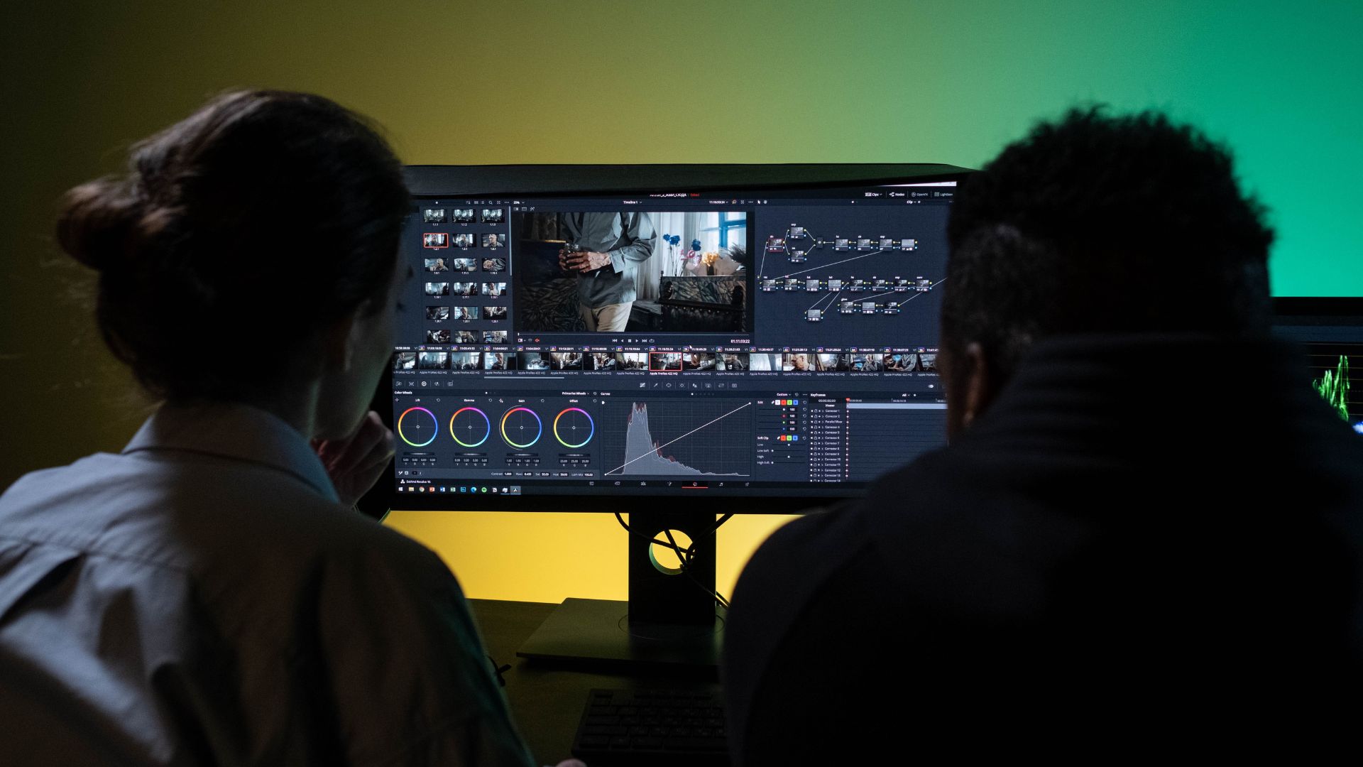 A group of people looking at a computer screen

AI-generated content may be incorrect.