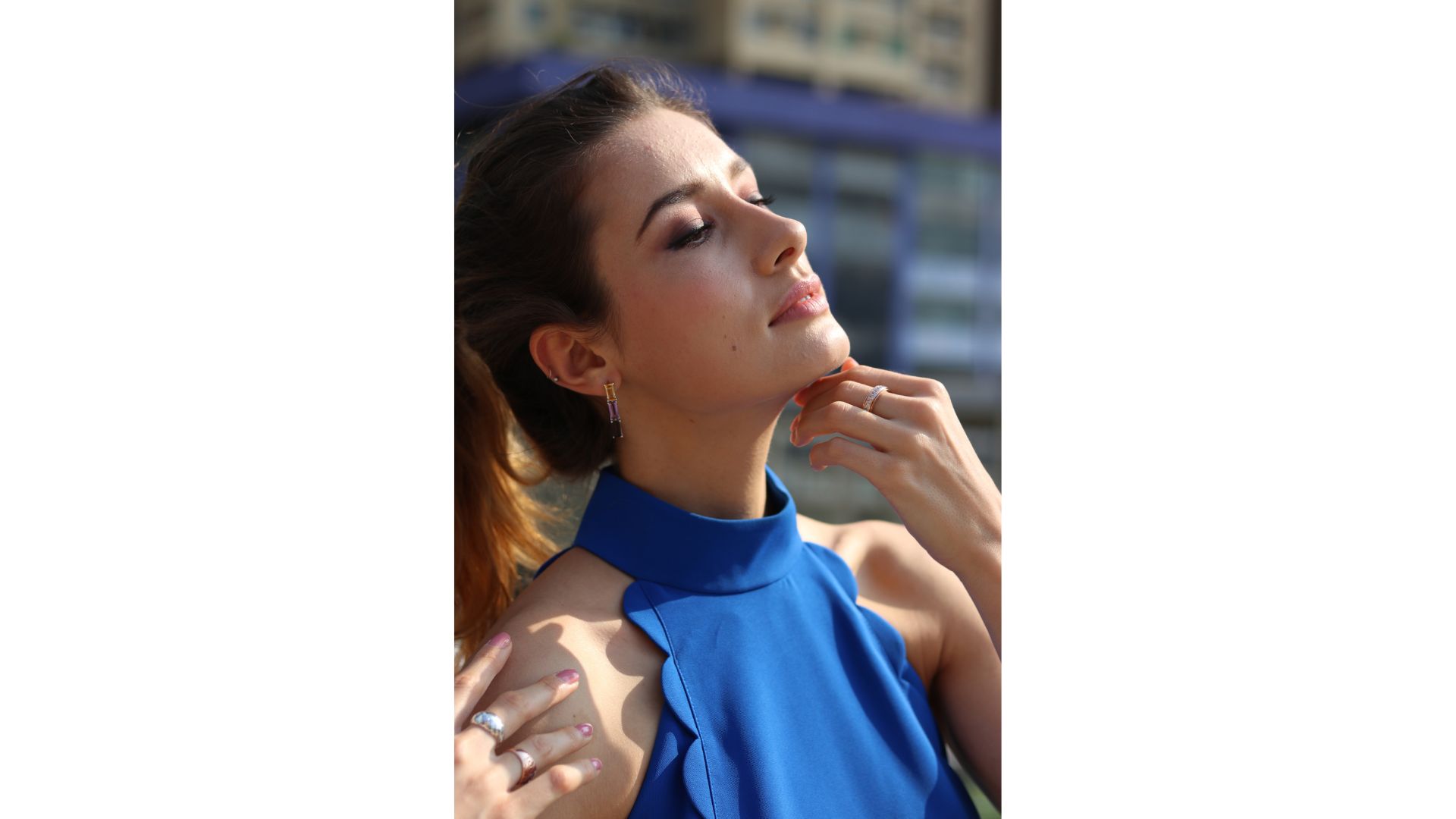 A person in a blue dress

AI-generated content may be incorrect.