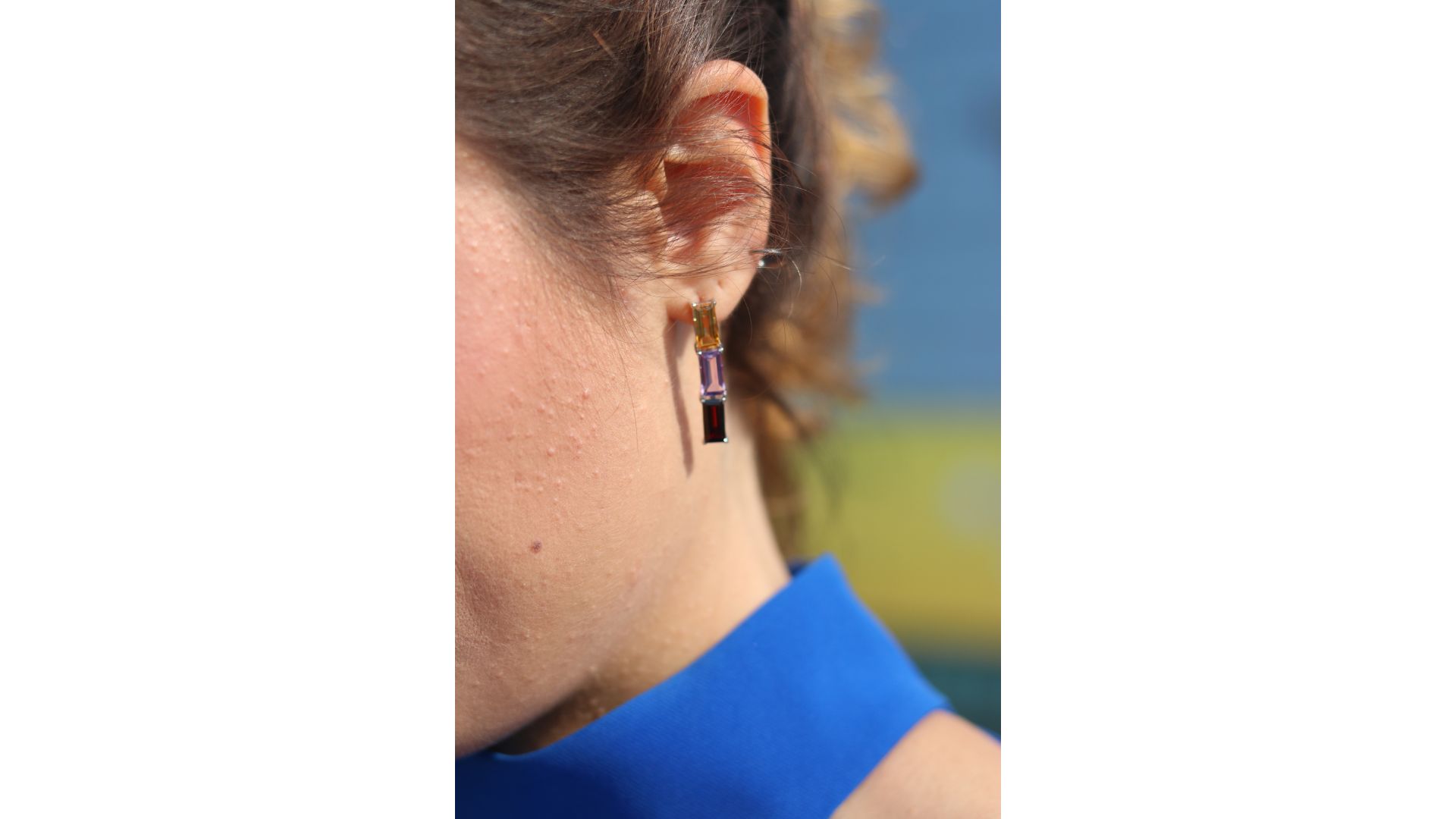 A close-up of a person's ear

AI-generated content may be incorrect.