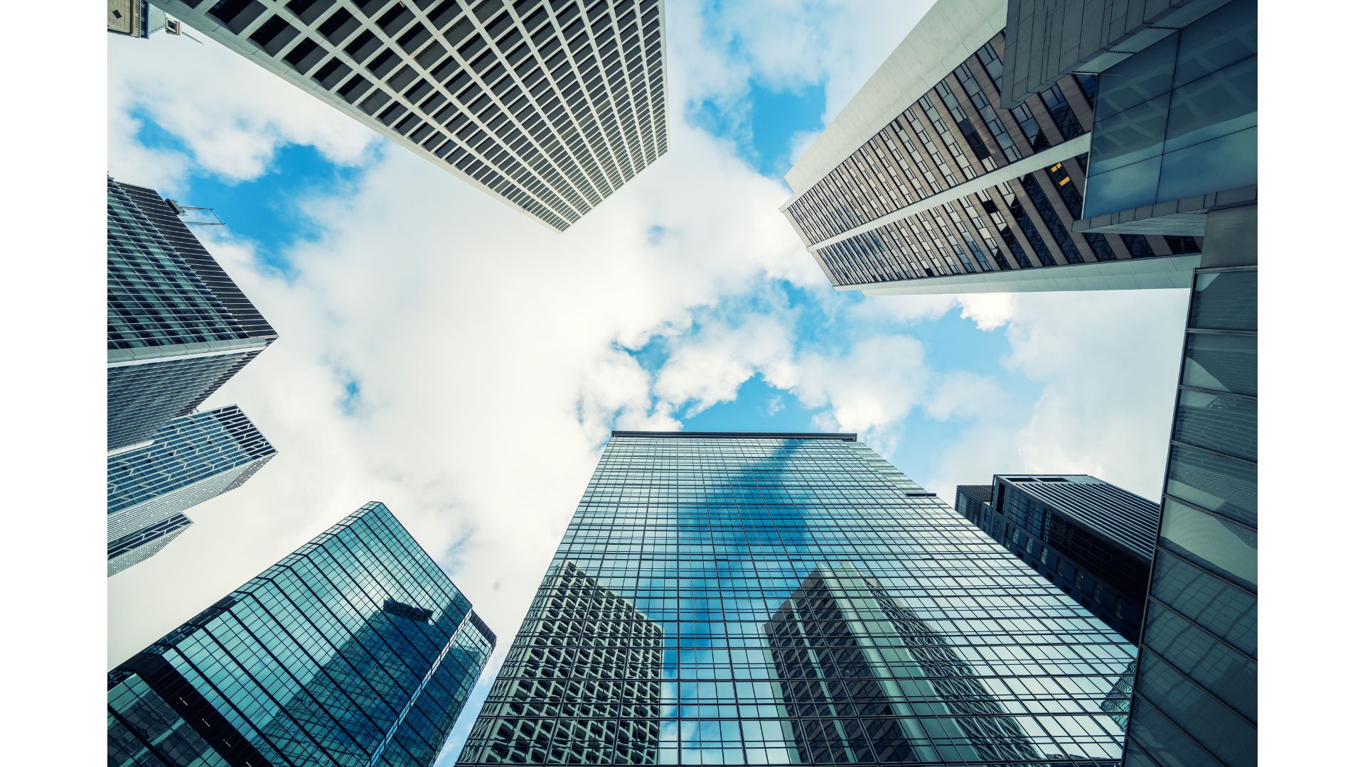Looking up view of tall buildings

AI-generated content may be incorrect.