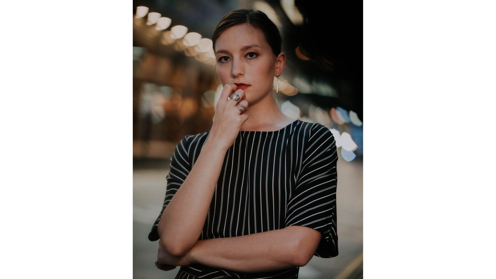 A person with her hand on her chin

AI-generated content may be incorrect.